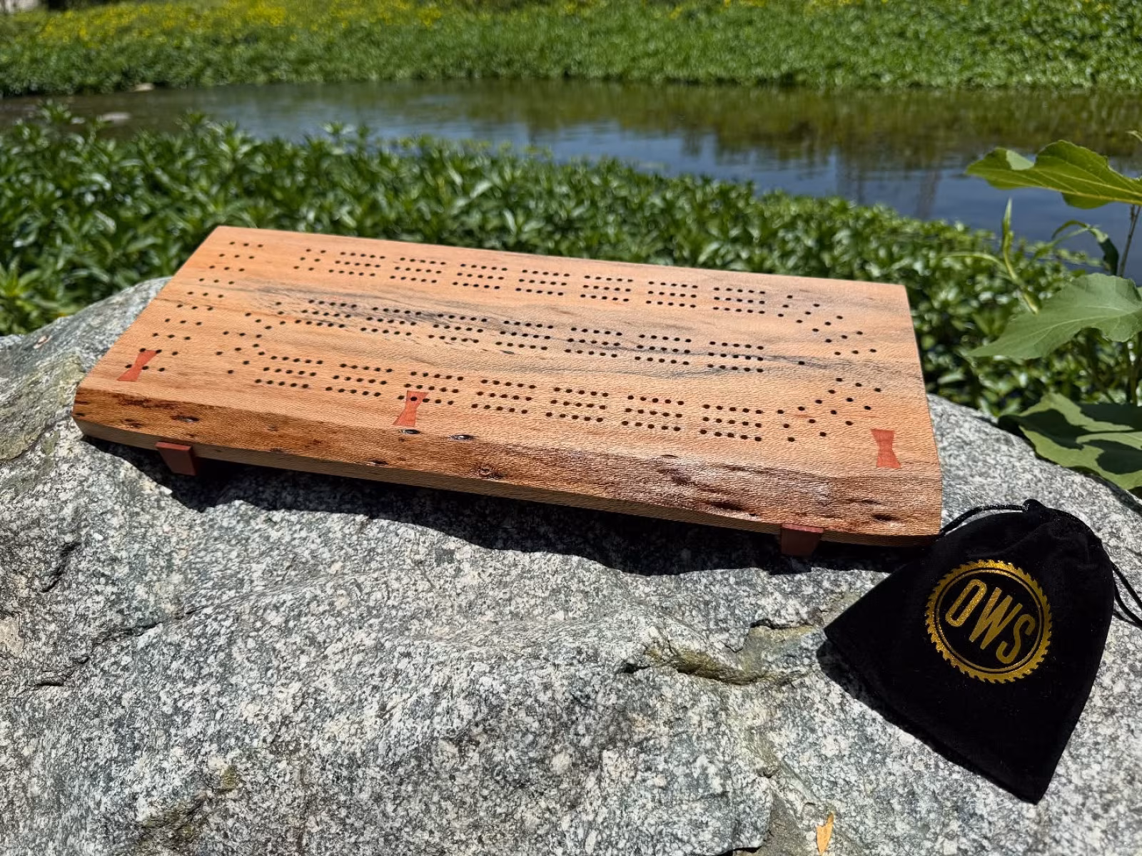 Nick Offerman Debuts Handmade Cribbage Board Limited edition game set in sycamore and eucalyptus, with metallic pegs and drilled holes.
