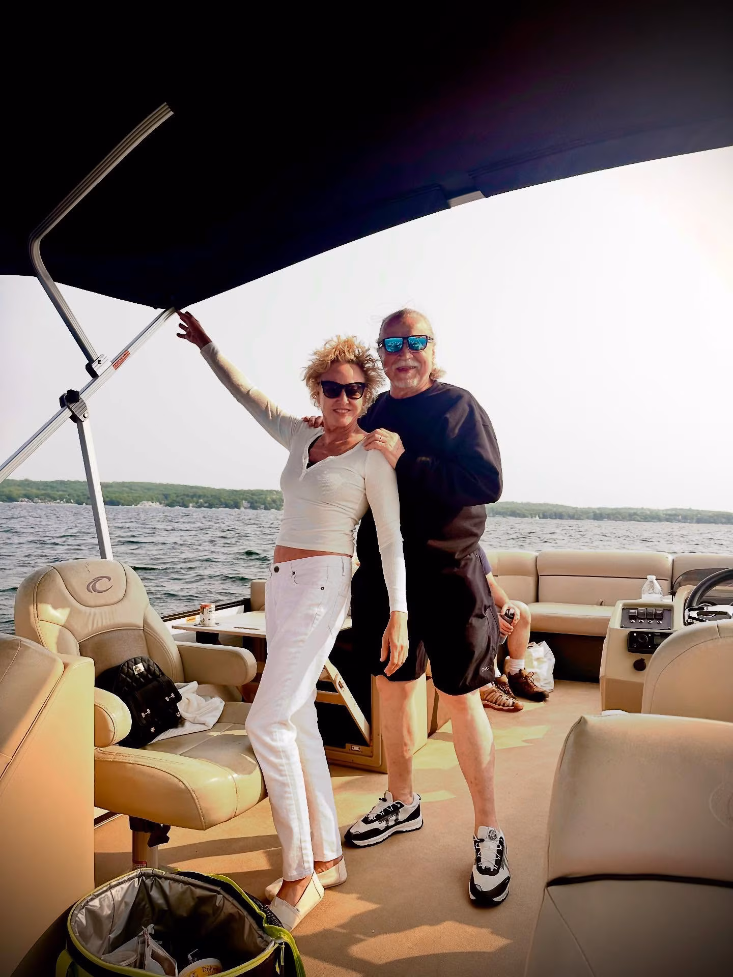 Virginia Madsen Cruises Into Summer With Family Lake Day Virginia Madsen swaps red carpets for pontoon life in a lakeside family reunion under sun.
